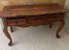 A console table with three drawers to centre on cabriole legs (H78cm W130cm D54cm)