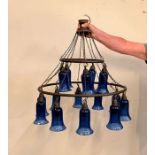 A two tier cobalt blue glass hurricane chandelier