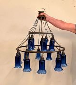 A two tier cobalt blue glass hurricane chandelier