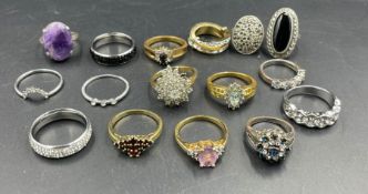 A selection of costume jewellery rings, various settings and styles.