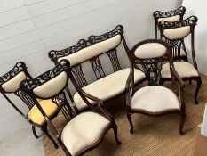 An Art Nouveau salon suite consisting of five chairs and a settee (H95cm W107cm D50cm)