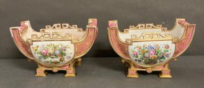 Two French porcelain centrepieces in the manner of Serres