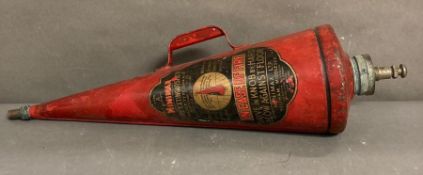 A vintage minimax fire horn or extinguisher