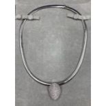 An 18ct white gold necklace with attachable pave diamond set pendant, with approximate 2cts of