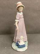 Girl Pulling Dolls Carriage/ Girl with Toy Wagon. Lladro. Designed by Vincente Martinez. #5044.