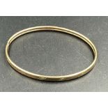 A 9ct gold bangle, approximate total weight 5.4g