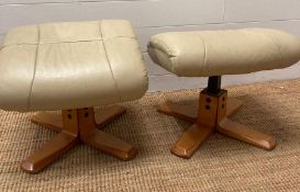 A pair of white leather upholstered foot stools