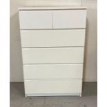 A two over four white contemporary chest of drawers (H123cm W80cm D48cm)