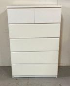 A two over four white contemporary chest of drawers (H123cm W80cm D48cm)