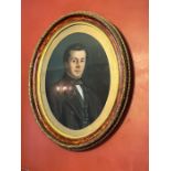 A portrait of a gentleman in an oval frame