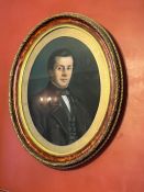 A portrait of a gentleman in an oval frame