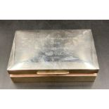 A rectangular silver cigarette box, cedar lined, the lid engraved with inscription Major J H T