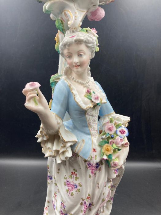 An 19th Century porcelain figural centrepiece depicting woman carrying flowers - Image 4 of 5