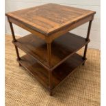A rosewood three tier table (H50cm SQ46cm)