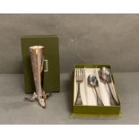 A boxed Christofle piccolo single stem vase and a Christofle fork and spoon set