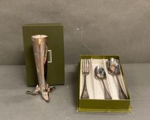 A boxed Christofle piccolo single stem vase and a Christofle fork and spoon set