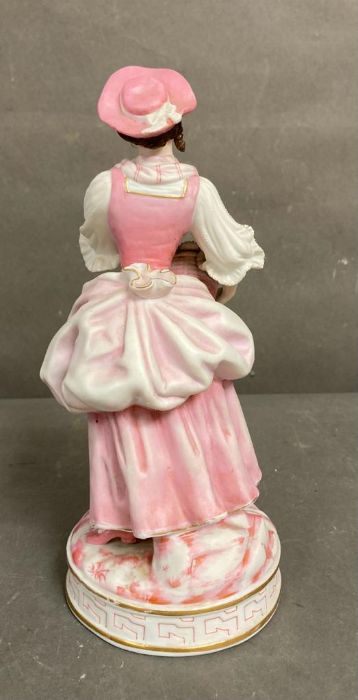 An 19th Century Bisque figure of a lady holding flowers - Image 3 of 5