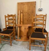 A pine four seater dining room table and chairs (152cm x 77cm)