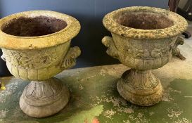 Two garden planters with cherub detail to sides and double handles