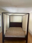 A contemporary wooden four poster bed with 5ft mattress