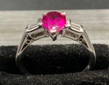 A Genuine high spec. high tech. 'AA' fine grade lab grown ruby and natural diamond ring.