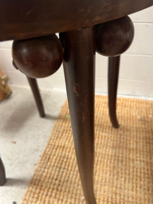 A circular side table on out sprayed legs and ball details to sides (H55cm Dia48cm) - Image 2 of 3