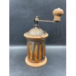 A vintage F.B. crossed swords coffee grinder