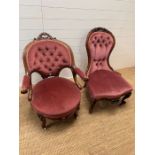 Antique 'His and Hers' Button back chairs.