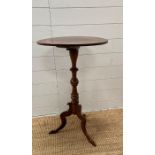 A mahogany inlaid pedestal side table on turned central column and splayed tripod legs (H76cm
