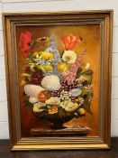 A still life oil on board of a floral arrangement by A Slade