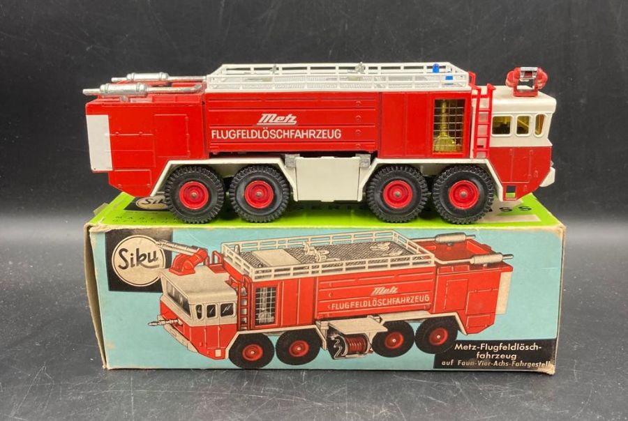 A vintage boxed Siku Metz fire truck
