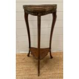 A Louis style mahogany and gilt side table with galleried marquetry top (H82cm W40cm D29cm)