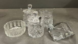 A selection of cut glass jars and pots