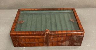 A Gregory Lobbs & Co pen display or cigar box in crocodile.