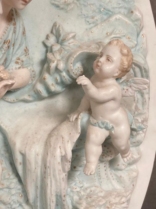 A porcelain bisque wall plaque of a courting couple and a cherub - Image 2 of 4