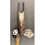 A selection of statement wall hanging traditional masks