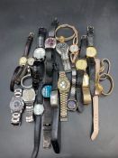 A large selection of wristwatches, various makers and styles.