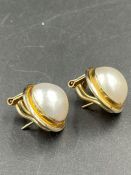 A pair of 14ct gold pearl earrings (Approximate total weight 10.5g)