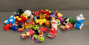 A selection of collectable mcdonads happy meal toys