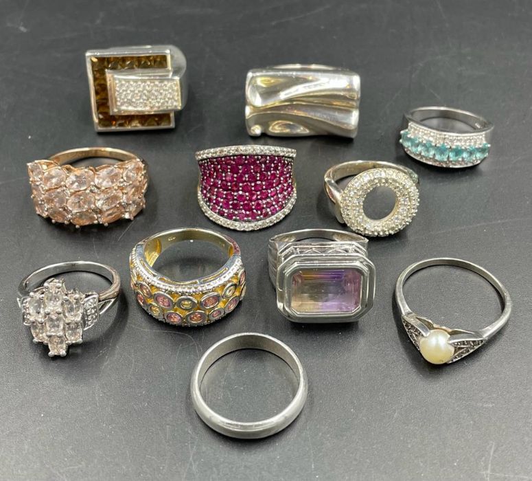 A selection of eleven quality silver fashion rings