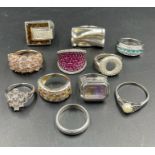 A selection of eleven quality silver fashion rings