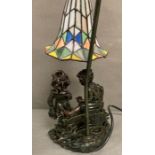 An art deco style goose neck table lamp with stained glass shade