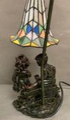An art deco style goose neck table lamp with stained glass shade