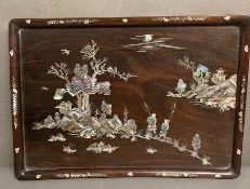 A chinese hardwood tray with mother of pearl inlay