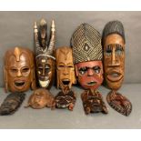 A selection of mixed wooden tribal masks