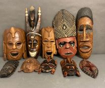 A selection of mixed wooden tribal masks