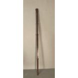 A vintage walking stick with heart motif