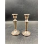 Two silver candle sticks hallmarked Birmingham AF