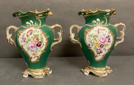 A pair of 19th Century green grounds floral decorated two handled vases, hand painted H23cm