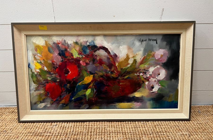 A floral still life on canvas signed top right 80cm x 40cm